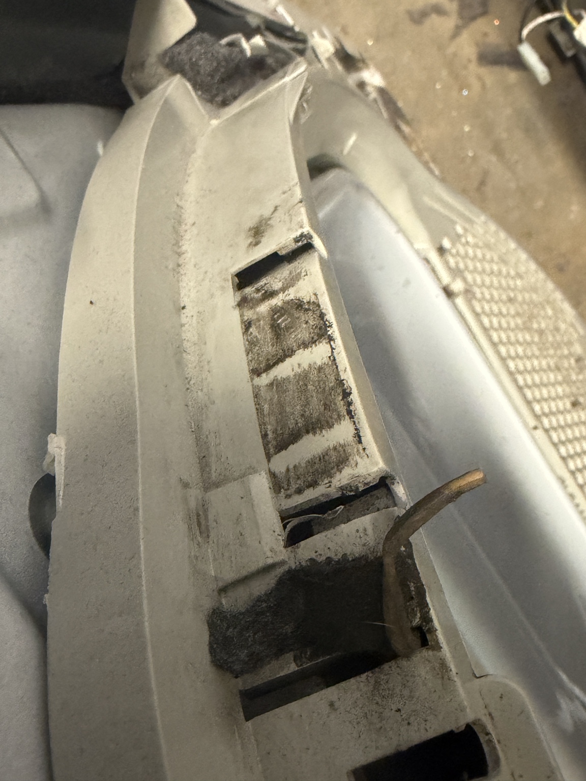 Top-load washer opened for spin, drain, or suspension inspection