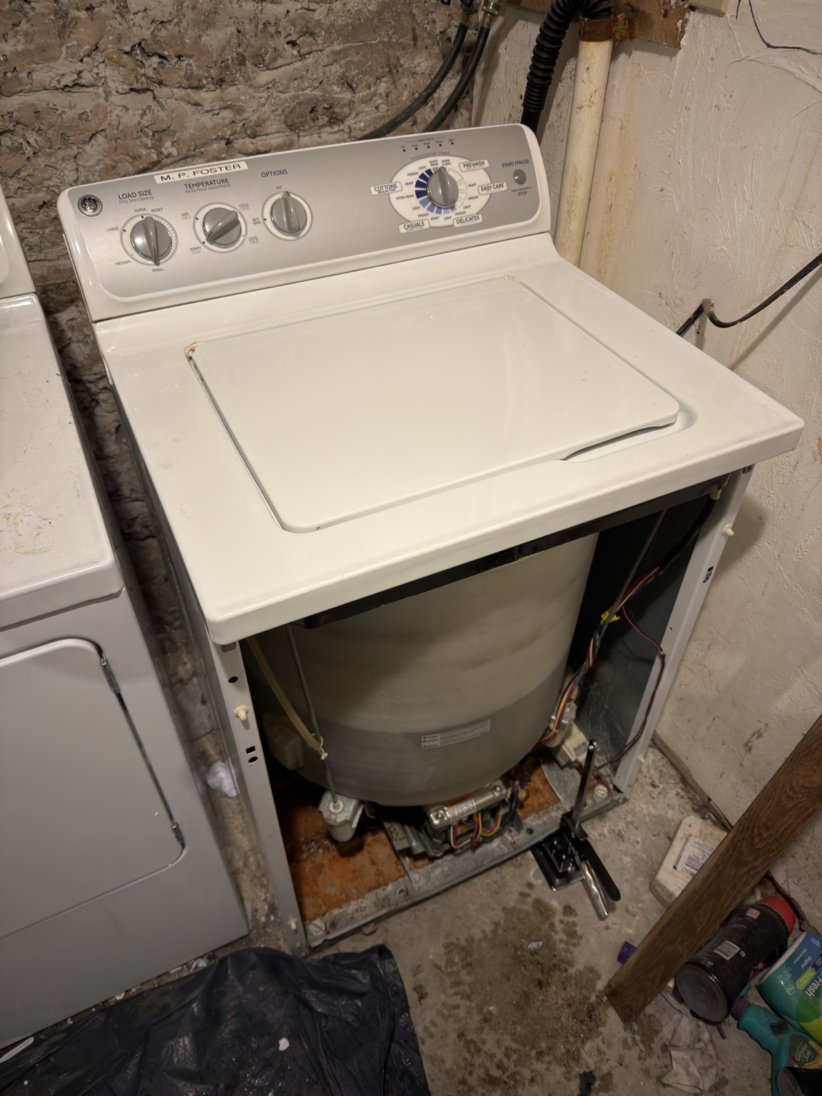 GE top load washer cabinet open