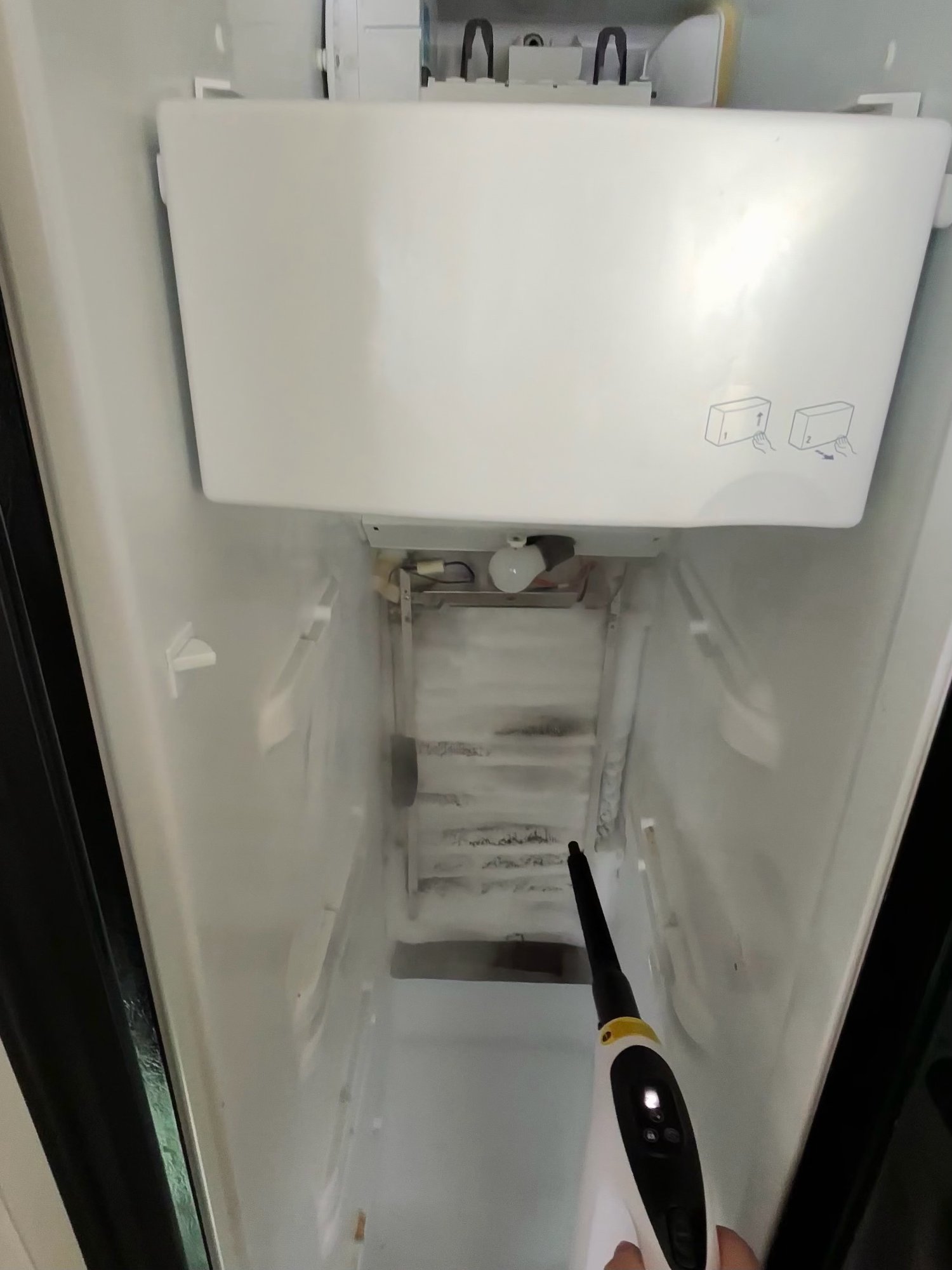 Refrigerator freezer coil defrost